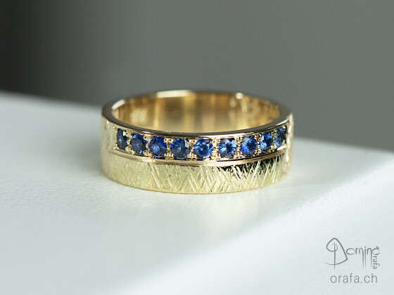 Crossed Lines and blue sapphires ring